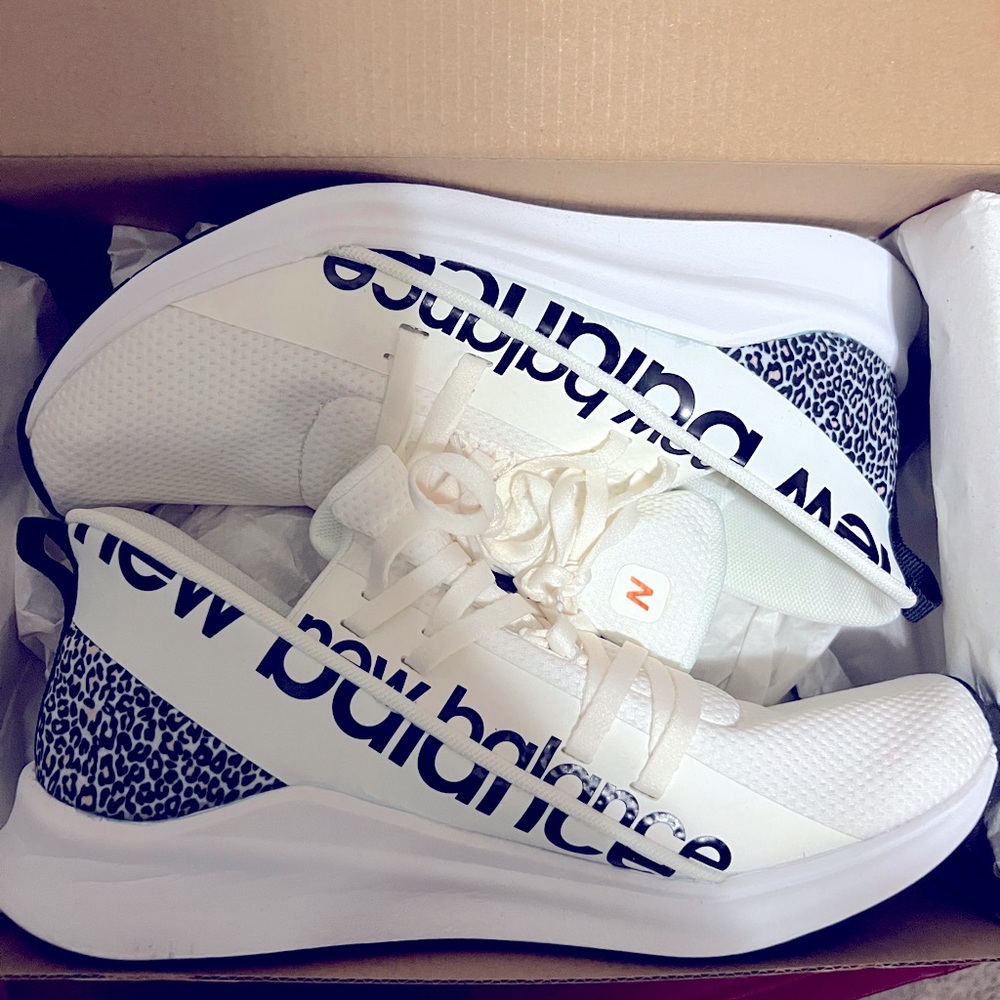 New Balance size 8 leopard print slip on sneakers